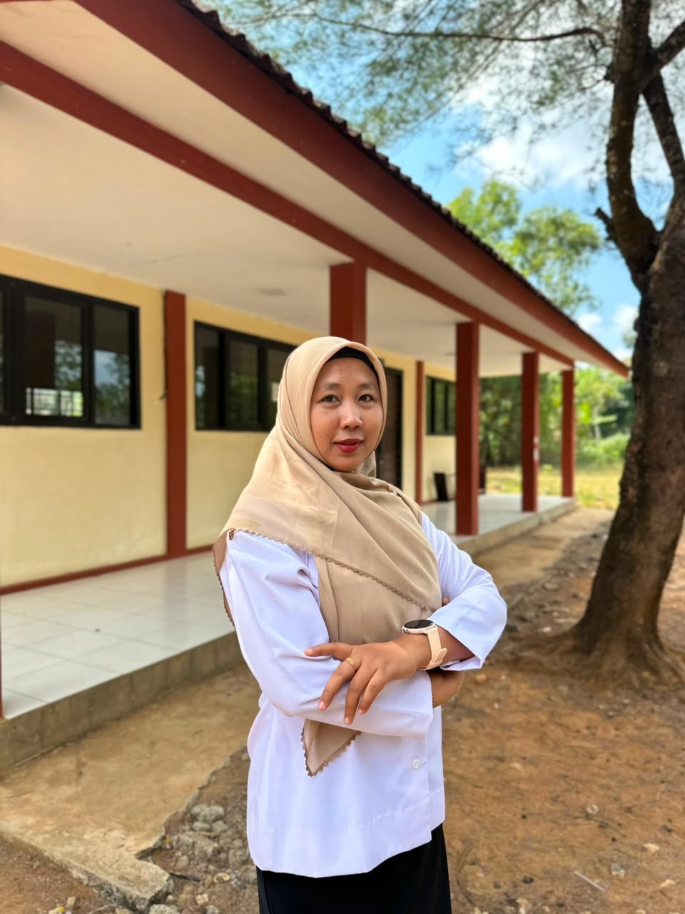 Tini Wulandari, S.Pd